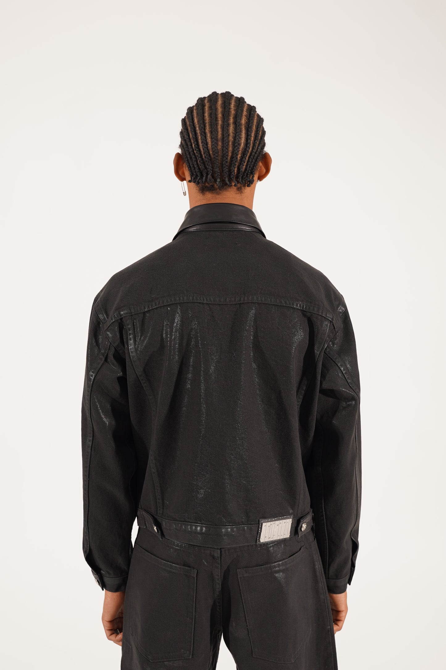 Brennende Gummijacke